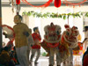 Bhagawan being welcomed into Sai Ramesh Krishan Hall in a procession led by Lion Dance