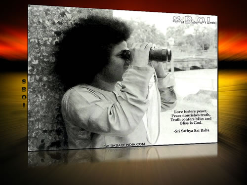 Sri -Sathya-Sai-Baba-with-binoculars (love-foster-peace...quote-wallpaper)