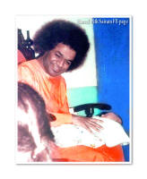 sathya-sai-baba-with-babay-on-his-lap